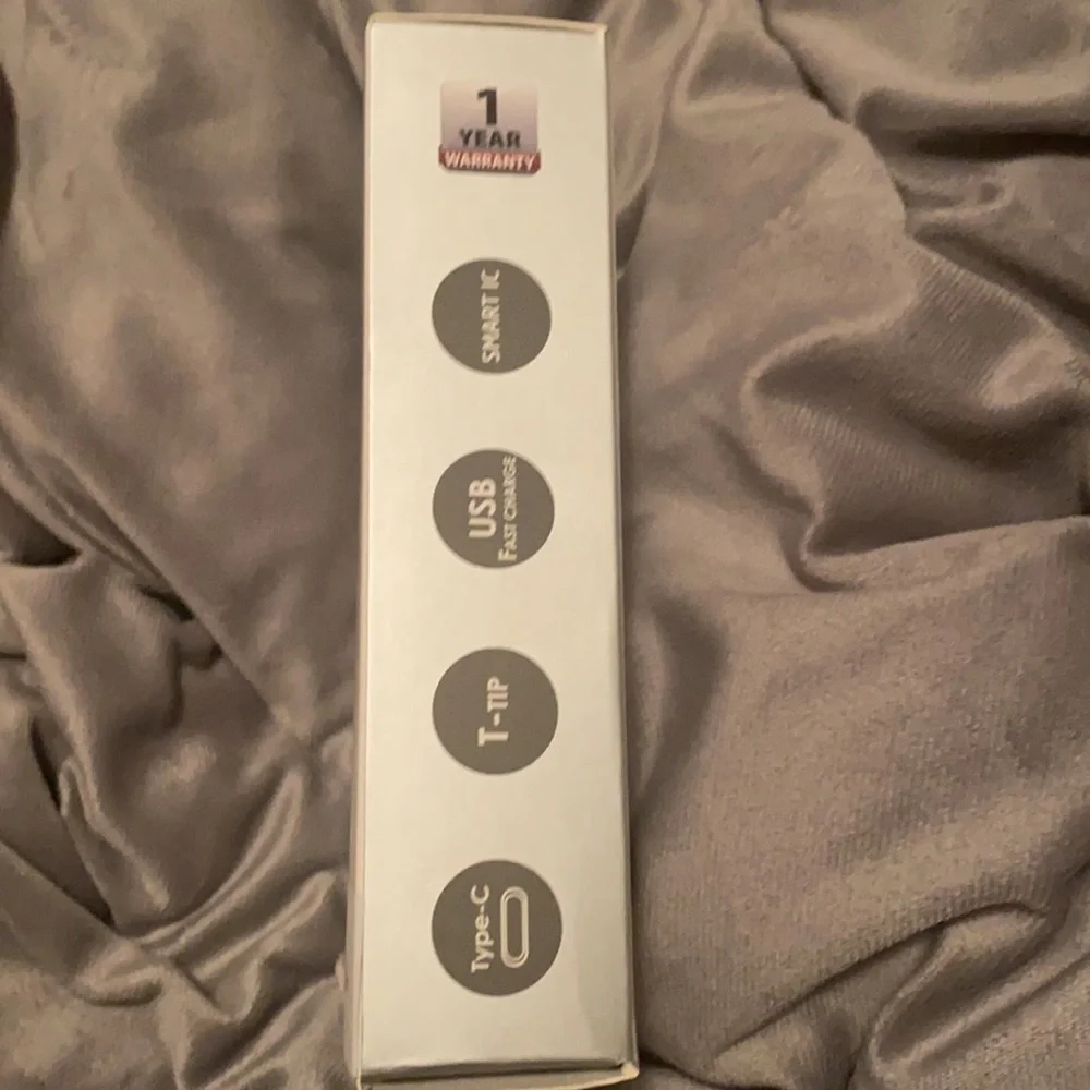 MacBook Air charger. 45w. Additional USB & Type-C charge for other gadgets.